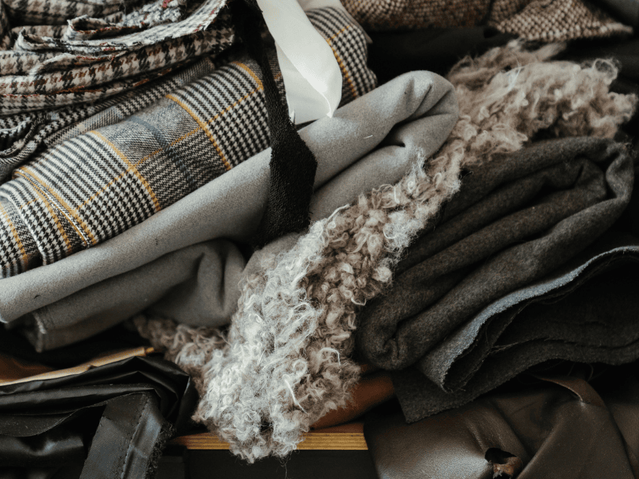 tweed fabric

Introduction

Tweed cloth occupies a unique region at the intersection of feature and fashion, combining rugged resilience with unmistakable refinement, able to withstand harsh climates. Woven traditionally from coarse, highland-sheep wool, tweed changed into to begin with prized with the aid of Scottish and Irish crofters for its capacity to withstand harsh, damp climates even as offering reliable warm temperature, a testament to its scottish heritage. 

This unassuming workwear fabric quickly stuck the eye of British USA. Gents in the nineteenth century, who recognized that its diffused flecks of coloration and distinctive twill or herringbone patterns lent an extended rustic charm to outdoor interests like searching, shooting, and riding.

As business looms supplanted the handweavers of antique, tweed cloth developed into a broader array of textures and weights—ranging from the heavyweight, wind-evidence Harris Tweed spun on the Outer Hebrides to the softer, lighter Saxony Tweed produced at the European continent. 

Yet regardless of those innovations, the essence of tweed remains unchanged: it's miles a material defined by means of its intently packed wool fibers and various tweed patterns, which entice insulating pockets of air, wick moisture, and withstand tearing. 

The interaction of undyed yarns—frequently combined from subtly numerous colorations before weaving—creates a signature heathered impact that complements both intensity and wales durability.



In the modern cloth wardrobe, tweed transcends its US Roots to turn out to be a versatile fashion staple. Iconic fashion houses like Chanel have famously reimagined the humble tweed jacket as a image of female beauty, drawing inspiration from traditional styles that appeal to women.  

At the same time as historical past labels together with Barbour and Loro Piana retain to honor conventional weaving techniques of their outerwear collections. 

Whether you’re seeking a robust coat for autumn nation-state walks or a dependent blazer for city sophistication, know-how what's tweed and appreciating its rich heritage and storied lineage will deepen your appreciation for a quality fabric that is essential in luxury apparel and practical clothing.  Centuries later, nevertheless weaves together craftsmanship, performance, and undying style.

Explore our modern-day tweed jacket and hats collection and see how this storied fabric keeps to shape contemporary fashion. Prefer to evaluate fabric? Check out our Fabric Comparison Guide.

1. What Is Tweed?

Tweed material is celebrated for its distinct mixture of durable sturdiness, warmth, and rustic beauty, making it a popular choice for wool jackets . At its center, tweed is a tightly woven, woolen fabric that makes use of long-staple wool fibers spun into yarns of various thickness. 

These yarns are then woven in conventional twill or herringbone patterns, which no longer most effective impart visual hobby but also enhance the material’s structural integrity, making it ideal for various wool products. The end result is a nubby, barely tough texture that traps air among fibers, supplying terrific insulation towards wind and bloodless.

The earthy, muted tones feature of tweed—suppose olive veggies, deep browns, and heathered grays—are completed via blending dyed wool before spinning. This mélange method creates diffused shade flecks throughout the weave, giving each piece of tweed material and accessories  completely unique intensity and tonal complexity. 

Beyond aesthetics, this technique permits weavers to control hue and pattern exactly, from the formidable checks of Glen plaid to the understated diagonal traces of traditional twill.



Functionally, tweed excels in outdoor clothing: its moisture-resistant features fend off light rain, even as its heavyweight nature stands up to abrasion. However, modern variations have added lighter-weight and mixed variations—combining wool with cashmere or artificial fibers—to fit warmer climates or tailored silhouettes. 

Whether you’re curious approximately what's tweed or planning your subsequent investment piece, this fabric’s enduring legacy lies in marrying practical overall performance with timeless fashion. 

2. History and Origin of Tweed Textiles

From its humble beginnings within the windswept hills of Scotland and the rugged landscapes of Ireland, tweed textiles emerged as the best material for crofters and farmers who needed strong, climate-resistant garb to withstand harsh climates. 

Handloom weavers in rural groups spun coarse, lengthy-staple wool into robust yarns, then wove them in simple twill or herringbone styles that shed water and blocked cold breezes. The flecked color—achieved via blending different shades of dyed wool—helped camouflage wearers against the heathery moorland, especially with classic patterns like windowpane.



By the early 19th century, those utilitarian garments caught the attention of Britain’s country gentry. Aristocratic sportsmen and princes, eager on shooting and riding excursions, favored tweed’s practical characteristics and its discreet, natural palette and pattern that blended with hunting grounds. London tailors began crafting bespoke jackets, breeches, and shooting coats from imported Scottish tweed, transforming it from farmwear into a symbol of refined country fashion.

The very term “tweed” may owe its origin to a printing error: A London merchant misread “twill” on an order for “twill cloth” and began marketing the fabric as “tweed,” inadvertently linking it to the nearby River Tweed on the Anglo–Scottish border. By the mid-1800s, as industrial looms expanded production in mills across Lanarkshire and Donegal, tweed became widely available, but its artisanal roots endured. 

In 1909, the Harris Tweed Authority was established to protect handwoven standards, ensuring that this storied fabric would continue to marry craftsmanship, heritage, and enduring style. By the mid-1800s, tweed was firmly entrenched in country wear, with bespoke tailors adapting its durable weave for hunting jackets and riding coats.

3. What Is Tweed Fabric Made Of?

Tweed fabric is historically made from 100% wool, most customarily sourced from hardy sheep breeds inclusive of Cheviot or Blackface that thrive in cooler climates and are carefully produced, creating tweed fabric.  that thrive in cooler climates and are carefully produced. 

Wool’s natural crimp and resilience deliver tweed its signature loft, trapping insulating air pockets and offering first-rate moisture wicking, which is often considered tweed. In its purest form—like the blanketed Harris Tweed—every level from fleece to completed fabric need to occur by means of hand at the Outer Hebrides, making sure most authenticity and structure.



To adapt tweed cloth for one of a kind rate factors and handfeel, manufacturers frequently combo wool with luxurious fibers together with cashmere or silk, which lend softness and subtle sheen to the lining without compromising warmth., often using interfacing for structure. Synthetic additions—like polyester or nylon—can also be brought in small probabilities (frequently 5–15%) to beautify abrasion resistance, reduce value, and improve washability.

Weaving techniques vary as a result: artisanal handlooms produce the choppy, nubby texture prized in background tweeds, whilst high-pace mill looms yield extra uniform selvages for broader industrial traces. 

Each yarn’s dyeing and spinning make contributions to tweed’s feature flecked appearance.

4. Types of Tweed Fabric







Type



Origin



Texture



Common Uses





Harris Tweed



Outer Hebrides, Scotland



Coarse, weatherproof



Overcoats, jackets





Donegal Tweed



County Donegal, Ireland



Speckled, colorful



Suits, waistcoats





Saxony Tweed



Saxony, Germany



Soft, lightweight



Blazers, skirts





Cheviot Tweed



Scottish Borders



Rough, sturdy



Outdoor gear, caps

5. Tweed in Fashion: Tweed Jackets, Suits & More

Tweed’s enduring attraction in style lies in its seamless blend of culture and innovation. The conventional tweed jacket—once the classic exceptional domain of USA. 

Estates.—has been reinterpreted by way of Barbour, whose waxed cotton jackets often feature high quality tweed accents around collars and cuffs, marrying practicality with heritage aptitude. 

Meanwhile, Coco Chanel elevated tweed cloth to haute couture repute in 1954, crafting the now-iconic boucle tweed jacket with braided trim, gold buttons, and a boxy silhouette that redefined ladies’s suiting.



6. Pros and Cons of Tweed Fabric

Tweed material has long been celebrated for its durability, warmth, and undying aesthetic. Among its key advantages, tweed offers great insulation due to its wool composition, which traps warmth at the same time as closing breathable, wicking away moisture to keep wearers comfortable. 

Its tight weave not simplest complements warm temperature however also gives staggering wind resistance, making it best for outerwear. Additionally, tweed’s durability makes it a pinnacle preference for high-use garments like jackets, trousers, and coats—it resists put on and retains its shape over time.



On the disadvantage, tweed’s heavier weight in comparison to fashionable fabrics can also sense cumbersome or restrictive, especially in hotter climate. It also calls for special care, usually needing professional dry cleansing to keep its structure and finish. Finally, price can be a deterrent; genuine, handwoven tweeds along with Harris Tweed are priced at a top rate due to the labor-intensive manufacturing and quality substances worried.

7. How to Care for Tweed Clothing Fabric

Proper care is essential to maintain the great and longevity of tweed garments. Dry cleansing is commonly recommended, mainly for tailor-made gadgets like suits and coats, as it facilitates keep the wool’s structure, coloration, and shape with out risking shrinkage. 

For minor stains, spot cleaning with bloodless water and a moderate wool-safe detergent is effective—gently blot the location in place of scrubbing, to keep away from negative the fibers.



Regular brushing with a soft-bristled garments brush is a exceptional way to remove dust, lint, and floor dust that might accumulate from sheep wool. This easy maintenance also revitalizes the fabric’s texture and look over time. 

For storage, constantly cling tweed garments on strong hangers inside breathable garment baggage—this prevents moisture buildup and lets in airflow, assisting to discourage moths and mold. Avoid plastic covers, which trap humidity. For brought protection, bear in mind the use of cedar blocks or lavender sachets to repel bugs clearly.

8. Environmental Impact of Tweed Production

Tweed fabric, traditionally made from big cloth and natural wool, offers some environmental benefits due to its renewable and biodegradable nature. Sheep produce wool annually, making it a sustainable fiber source when managed responsibly. 

Additionally, wool decomposes naturally, unlike synthetic fibers that can persist in landfills for decades. However, tweed’s environmental footprint also depends on production practices.

Certifications like the Global Organic Textile Standard (GOTS) and sourcing from environmentally conscious suppliers create a process that ensures that tweed is made with minimal environmental harm. Supporting artisan, small-batch, or heritage brands also encourages sustainable farming, ethical labor, and lower emissions due to localized production methods.

Final Thoughts: Why Tweed Is a Wardrobe Classic

From its humble agricultural origins to the runways of Paris, tweed remains a image of workmanship and fashion, making it a must-shop item for stylish individuals. 

Whether you’re making an investment in a heritage tweed jacket or experimenting with combined varieties, this timeless material provides performance and panache, perfect for everyday wear. Embrace tweed’s rich textures and storied past in your dress —your cloth wardrobe (and the planet) will thanks.